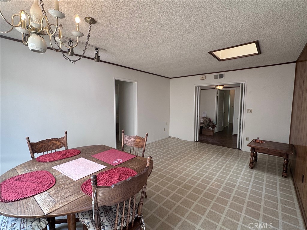 20631 Romar Street Chatsworth, CA 91311 - Photo 5 of 34 a view of a dining room with furniture