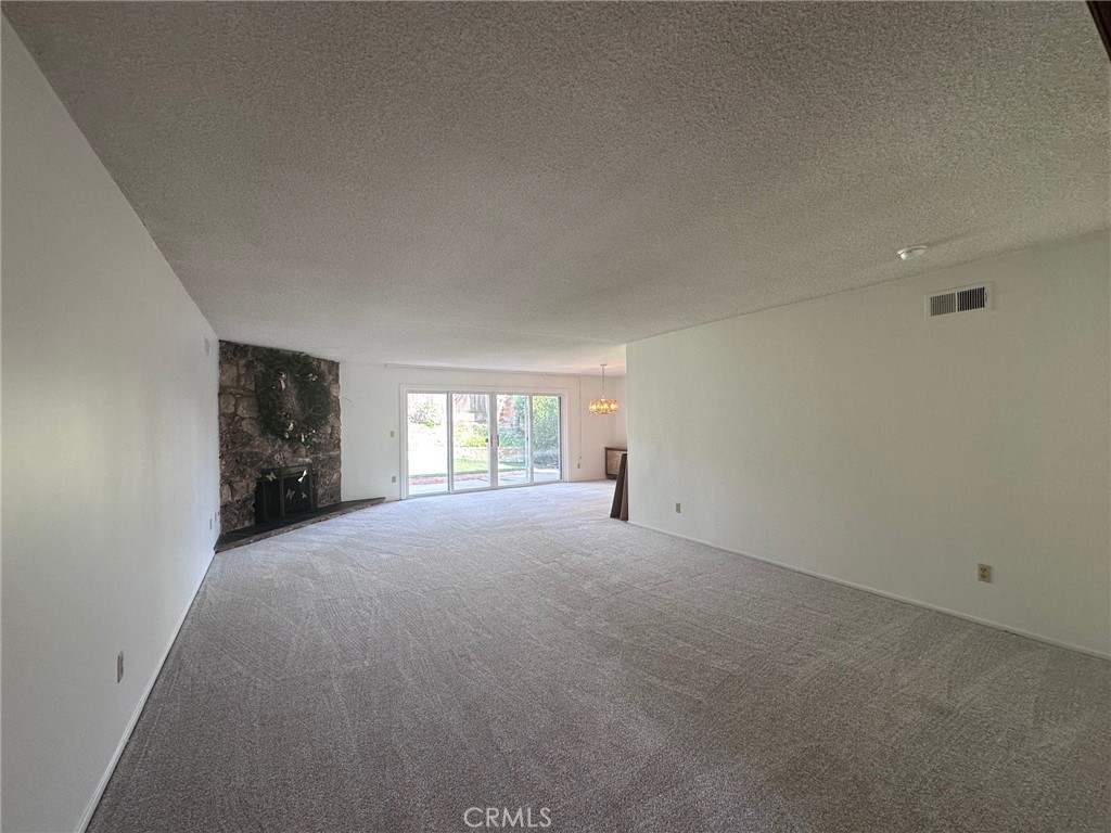 20631 Romar Street Chatsworth, CA 91311 - Photo 9 of 34 an empty room with windows