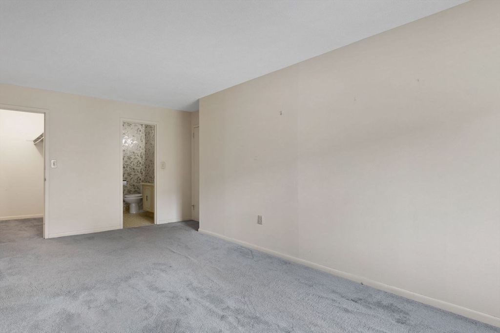 1008 Paradise Road, Unit 2Q Swampscott, MA 01907 - Photo 20 of 25 a view of an empty room and closet area