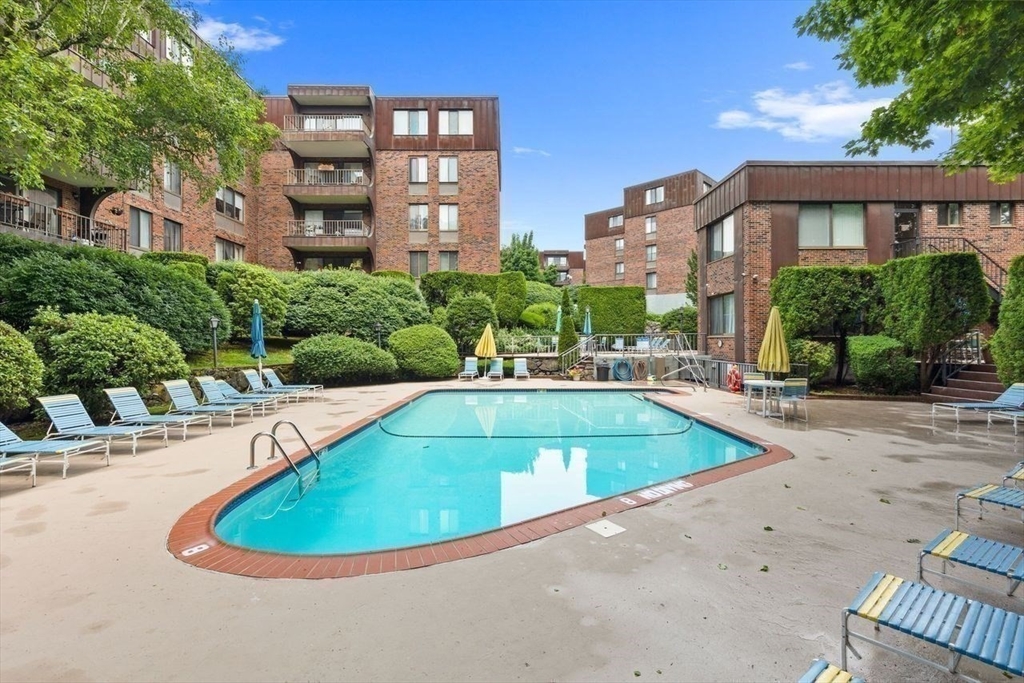 1008 Paradise Road, Unit 2Q Swampscott, MA 01907 - Photo 24 of 25 a view of outdoor space yard swimming pool and porch