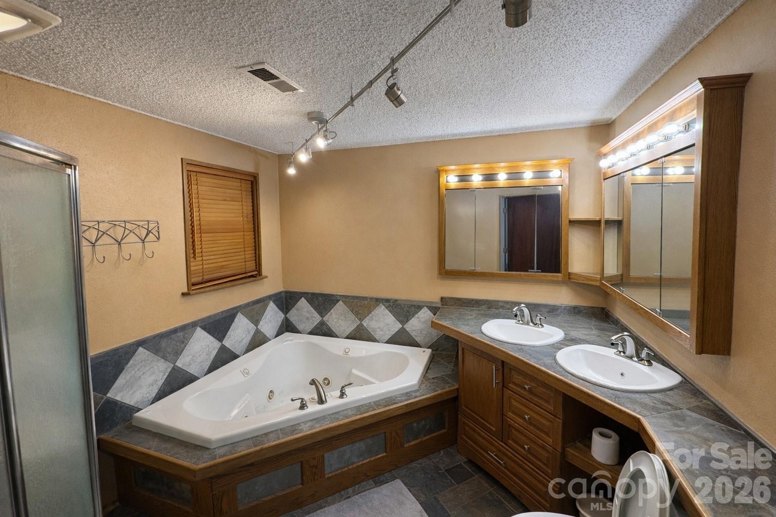 2112 New Prospect Church Road Shelby, NC 28150 - Photo 5 of 9 a bathroom with a tub sink and mirror