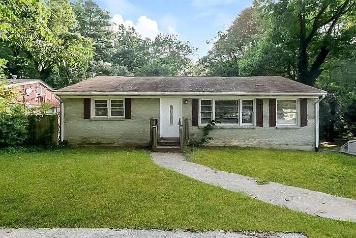 2502 Sylvan Road East Point, GA 30344 - Photo 1 of 1 a view of a house with a yard