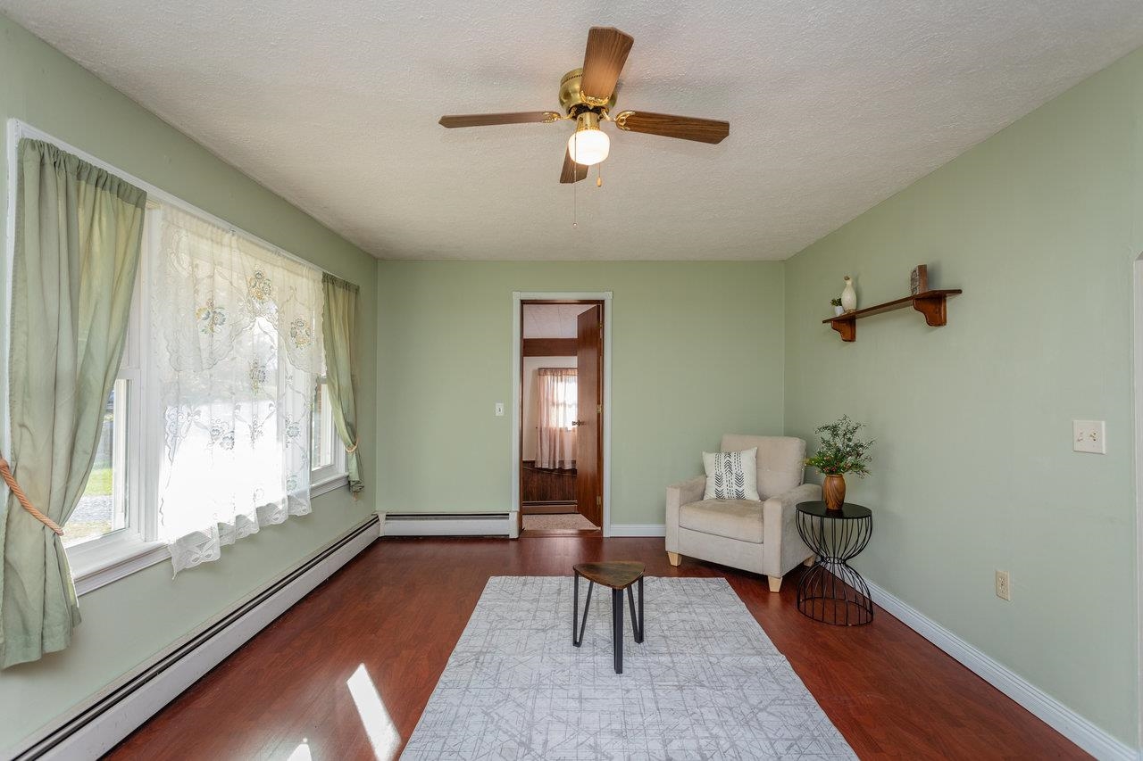 911 Old White Hill Road Stuarts Draft, VA 24477 - Photo 13 of 40 a living room with furniture and a window
