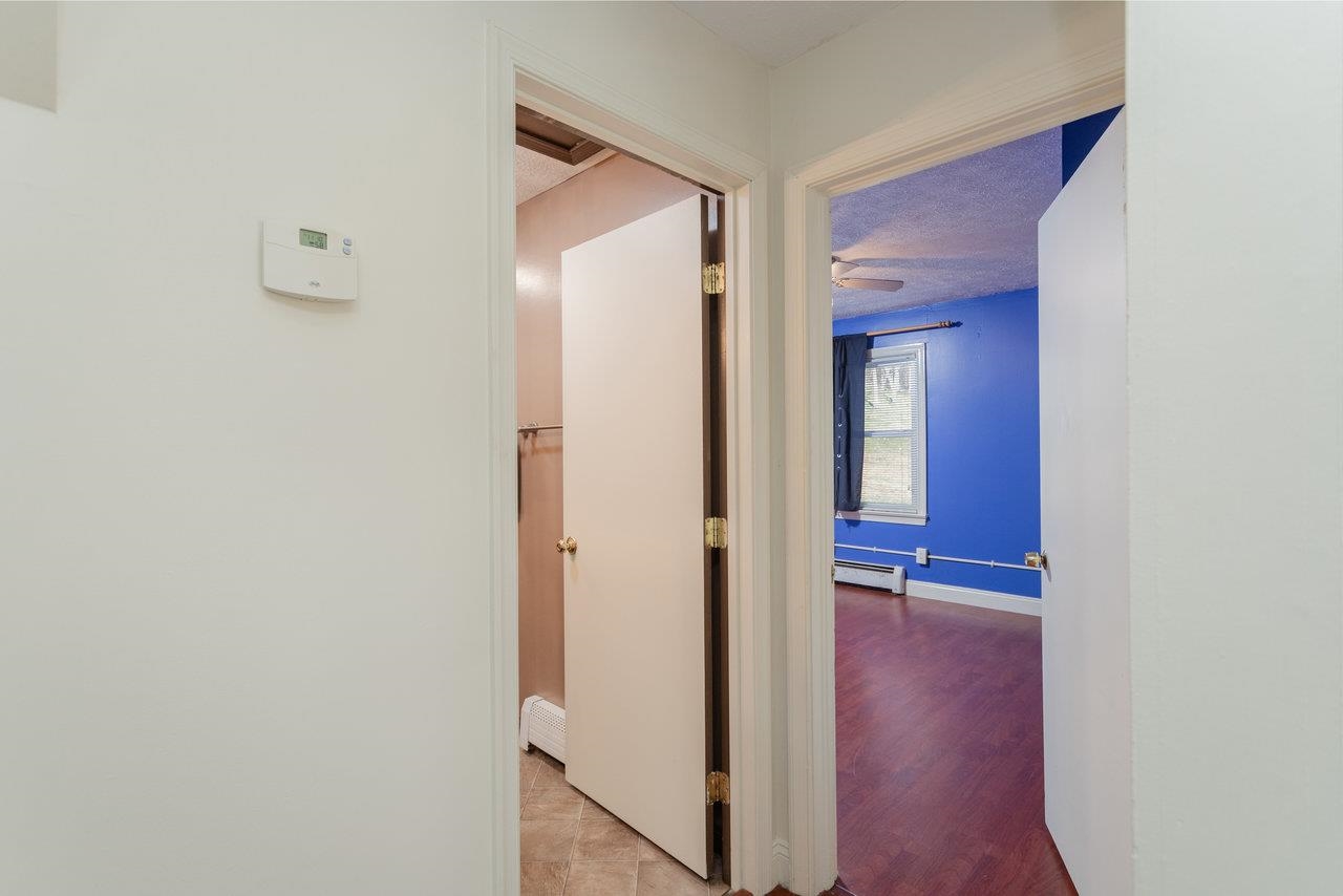 911 Old White Hill Road Stuarts Draft, VA 24477 - Photo 18 of 40 a view of a hallway with wooden floor