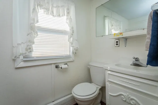 a bedroom with fireplace