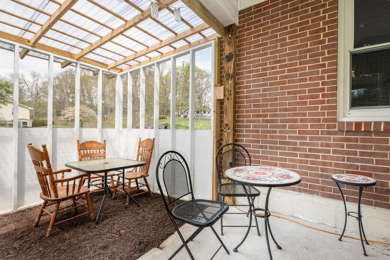 911 Old White Hill Road Stuarts Draft, VA 24477 - Photo 7 of 40 a view of a chairs in a patio