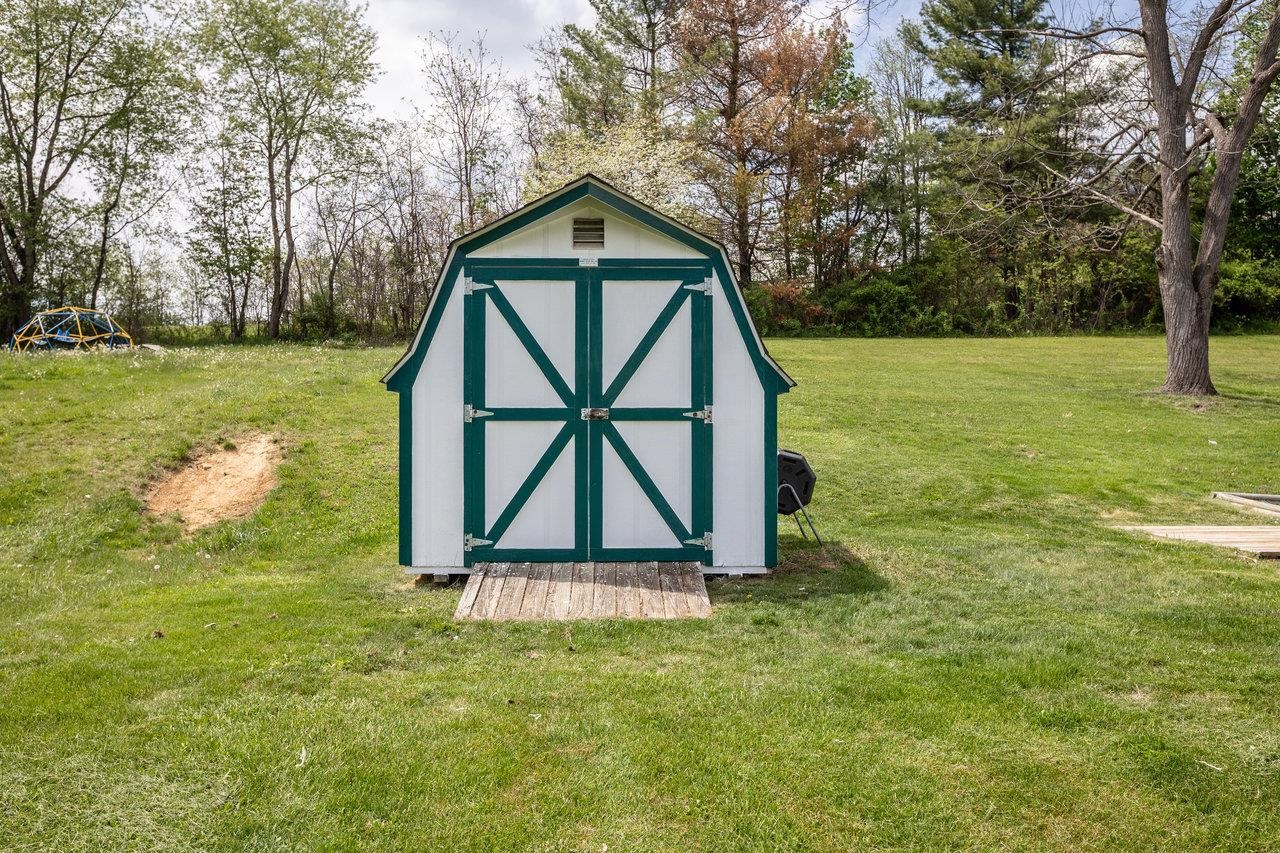 911 Old White Hill Road Stuarts Draft, VA 24477 - Photo 8 of 40 a front view of a house with garden