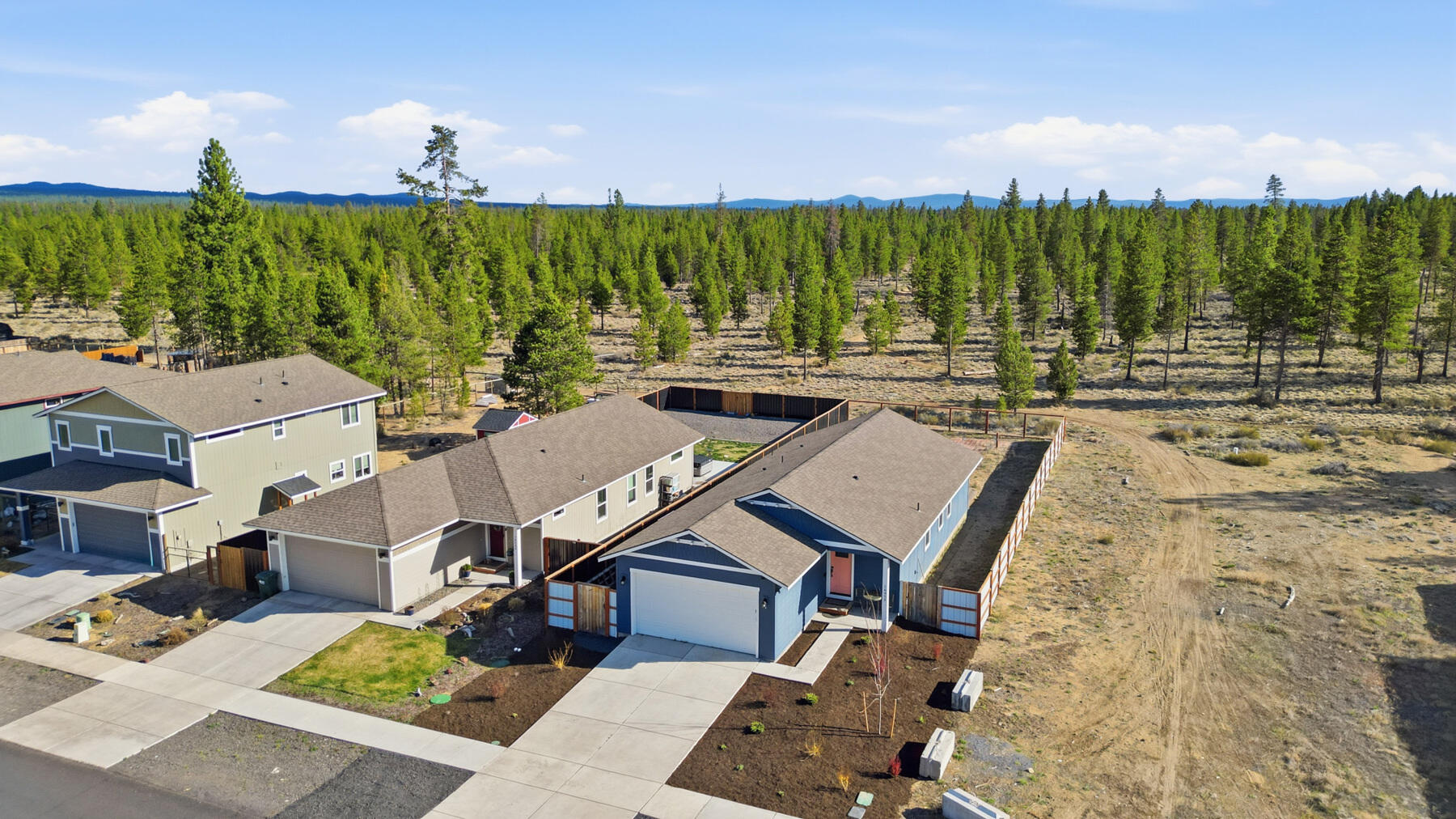 16455 Bassett Road La Pine, OR 97739 - Photo 37 of 44 an aerial view of a residential building with swimming pool and outdoor seating