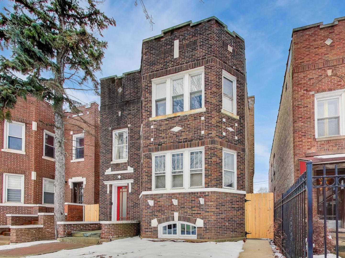 a front view of a multi story residential apartment building