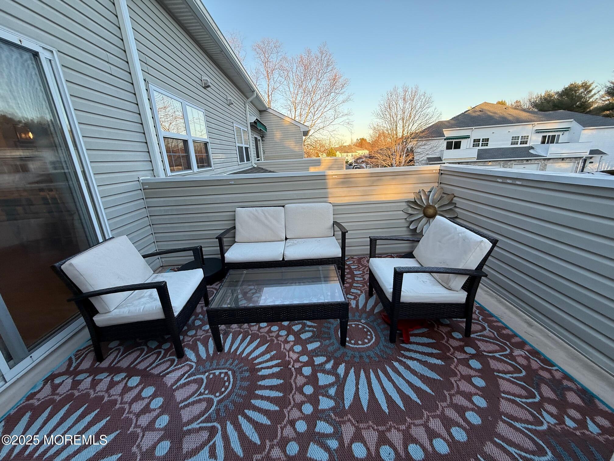 388 Deuce Drive Wall, NJ 07719 - Photo 27 of 38 a view of a terrace with seating area