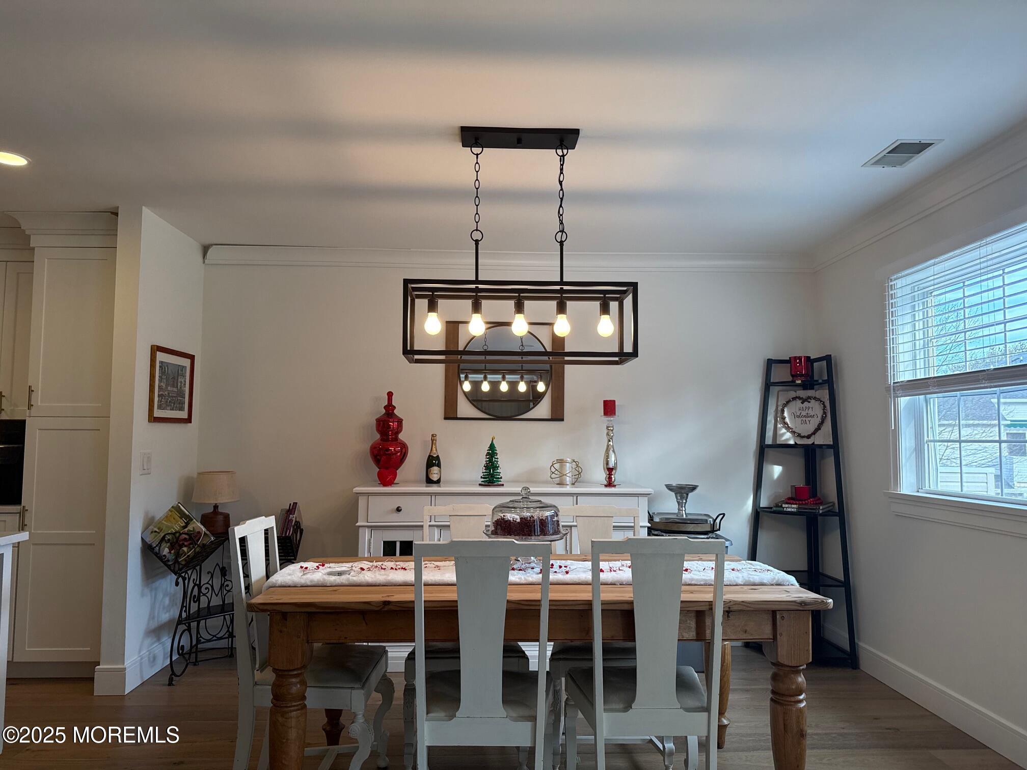 388 Deuce Drive Wall, NJ 07719 - Photo 9 of 38 a view of a dining room with furniture