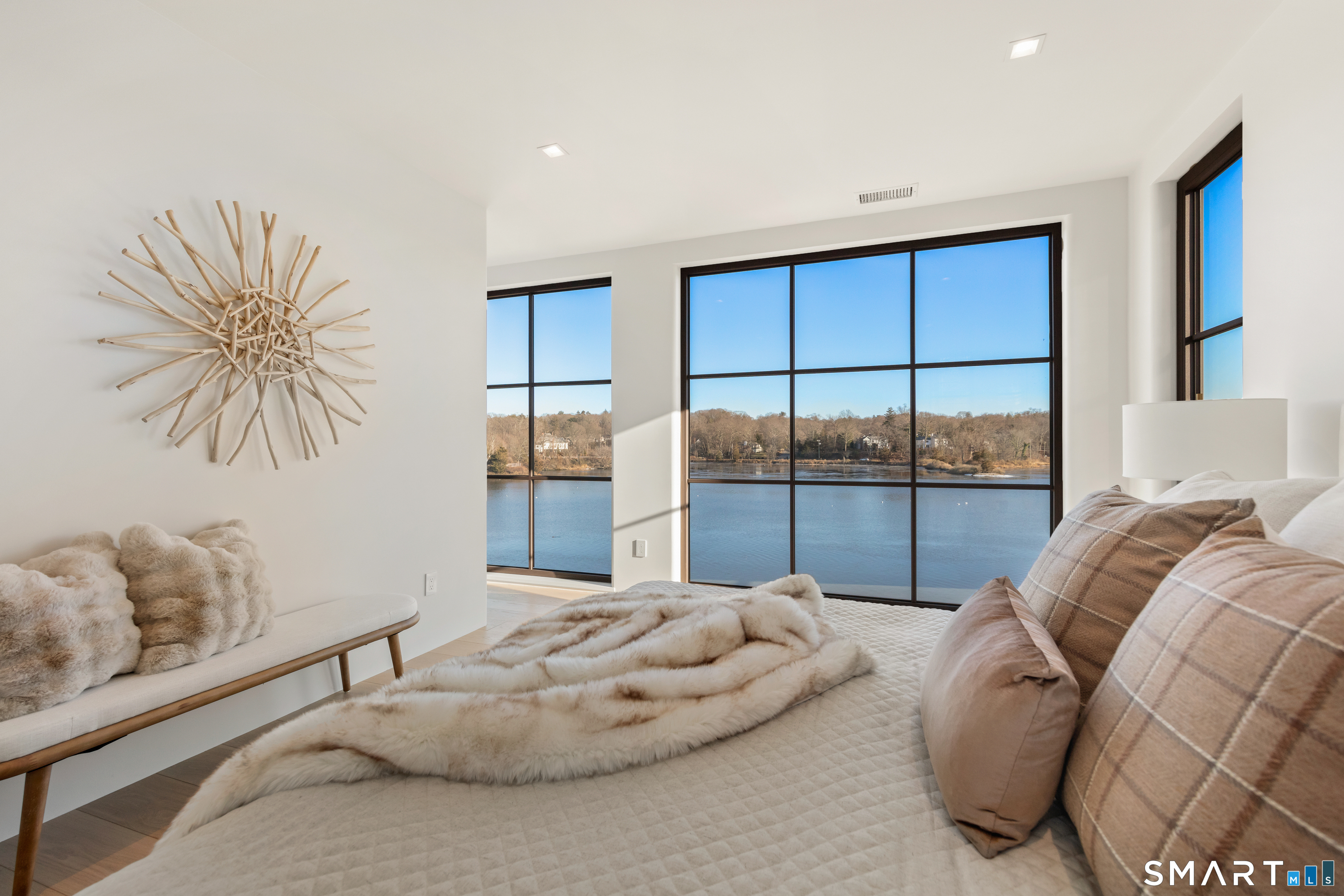79 Riverside Avenue Westport, CT 06880 - Photo 14 of 40 a living room with furniture and a large window