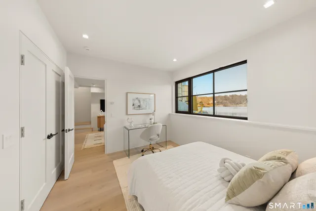 a view of a lake with a nearby beach