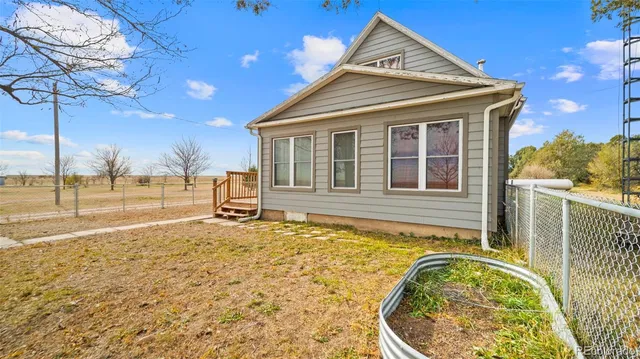 a house view with a outdoor space