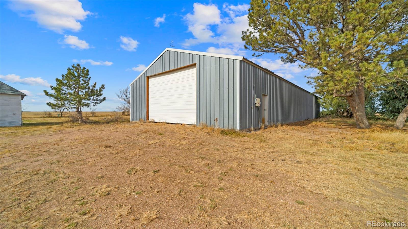 1935 County Road 75 Fleming, CO 80728 - Photo 27 of 50 a backyard of a house
