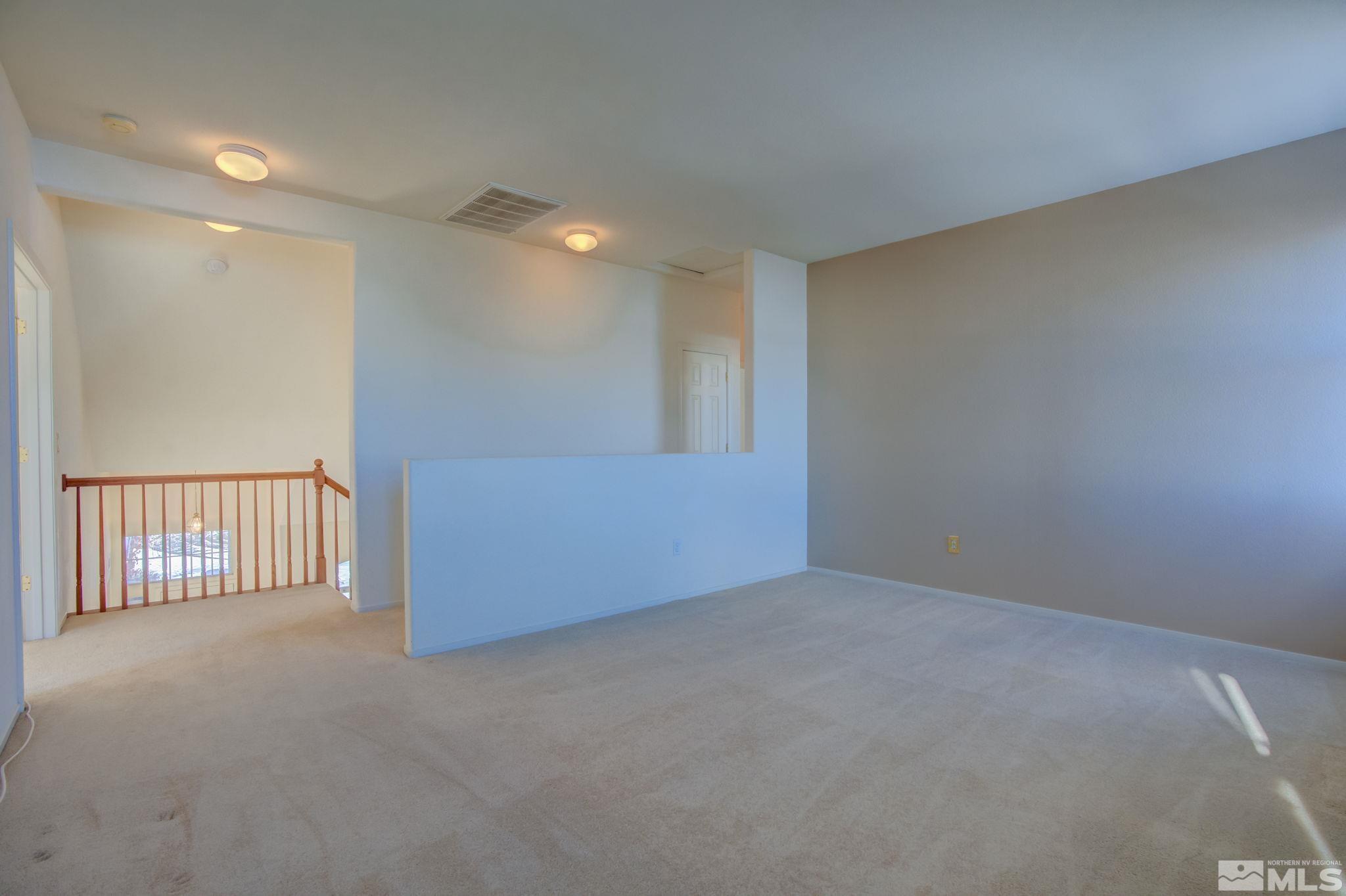 10692 Copper Moon Court Reno, NV 89521 - Photo 23 of 40 a view of an empty room