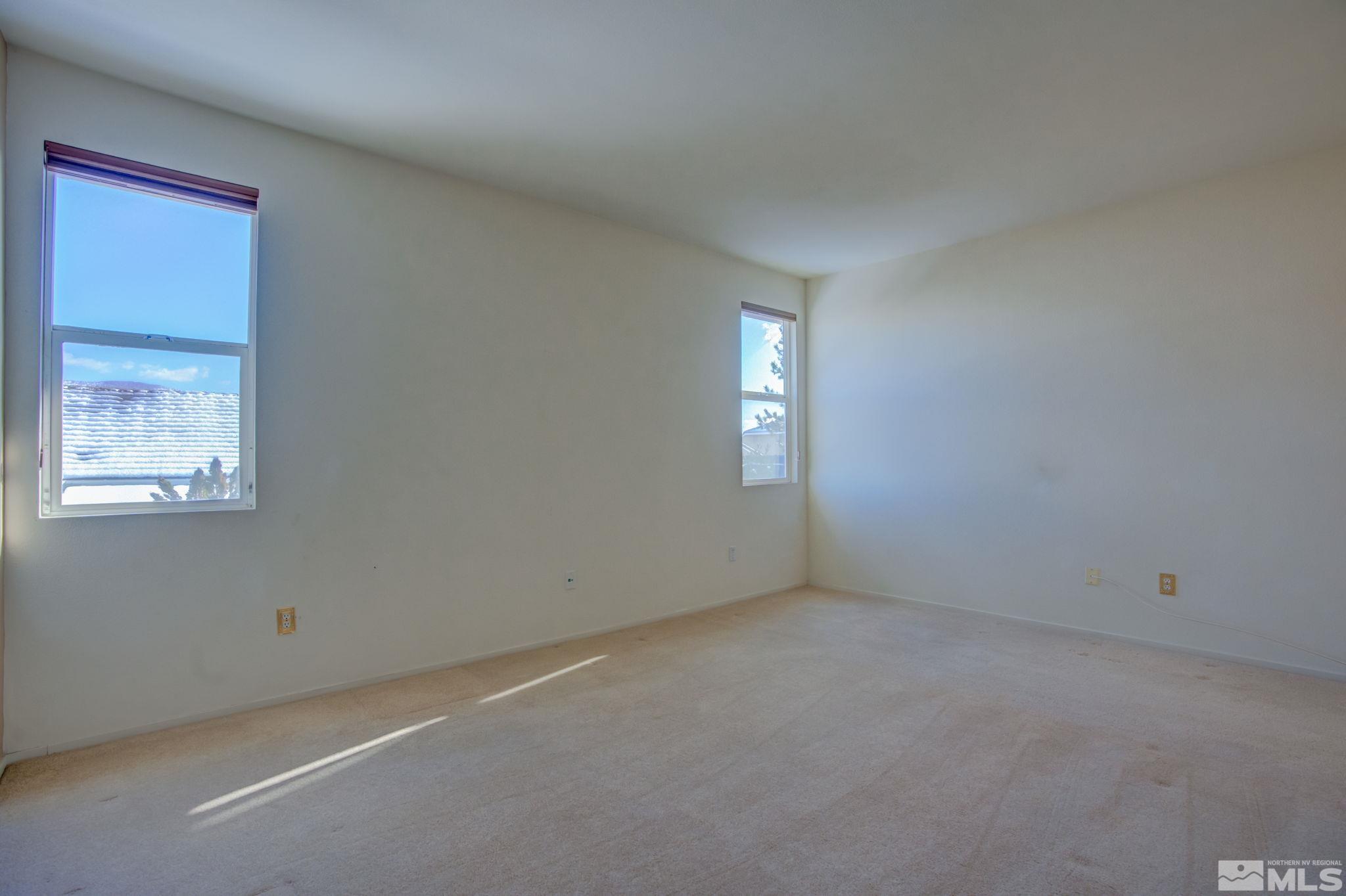10692 Copper Moon Court Reno, NV 89521 - Photo 25 of 40 an empty room with a window