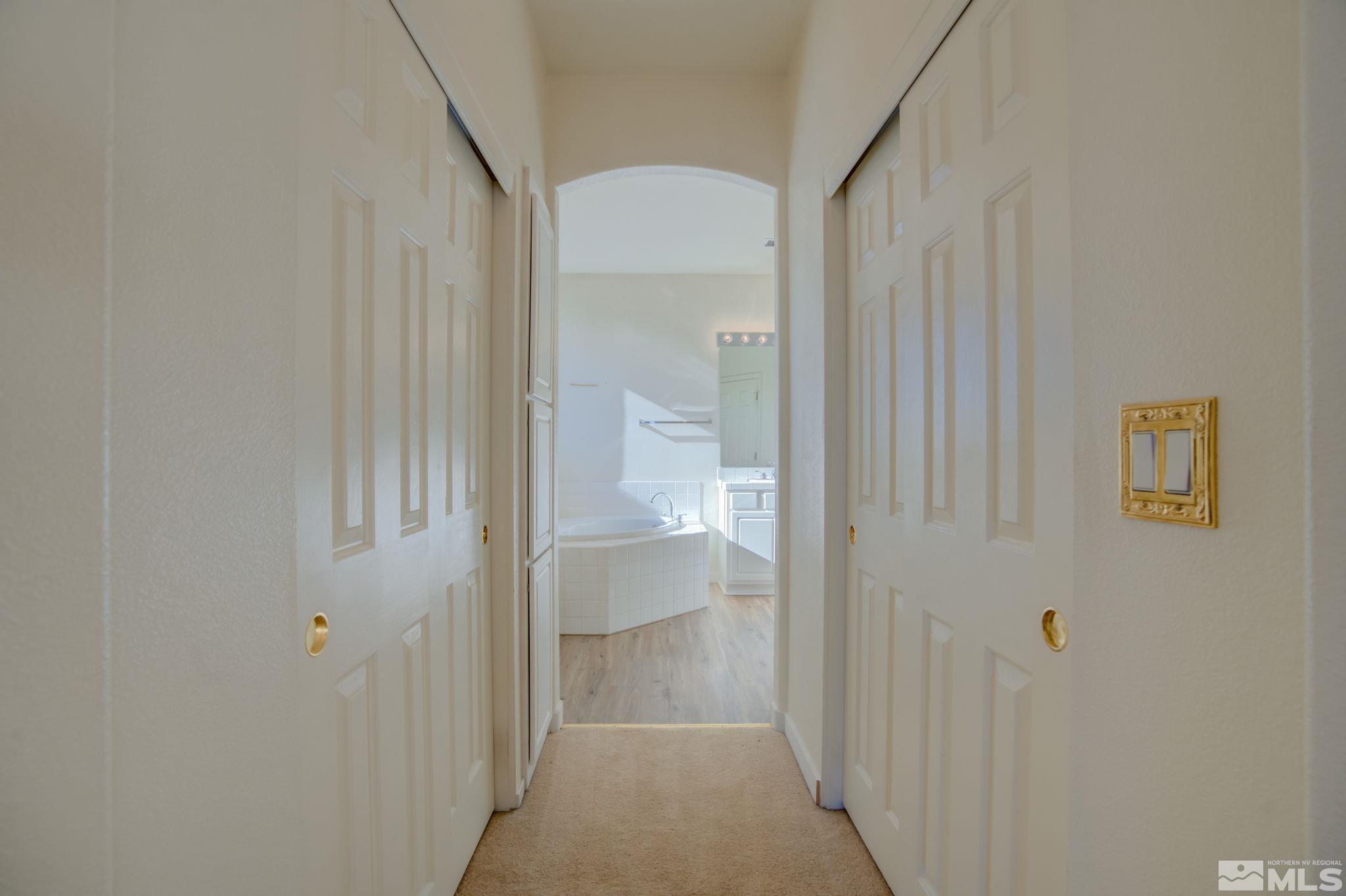 10692 Copper Moon Court Reno, NV 89521 - Photo 28 of 40 a view of a bathroom from a hallway
