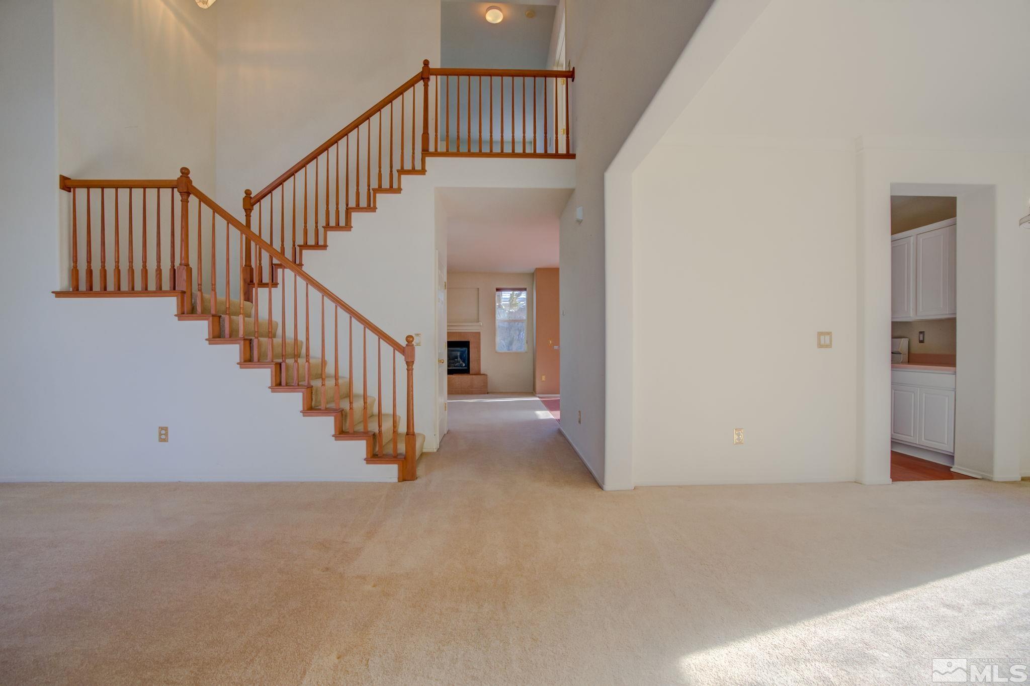 10692 Copper Moon Court Reno, NV 89521 - Photo 4 of 40 a view of staircase with white walls and stairs