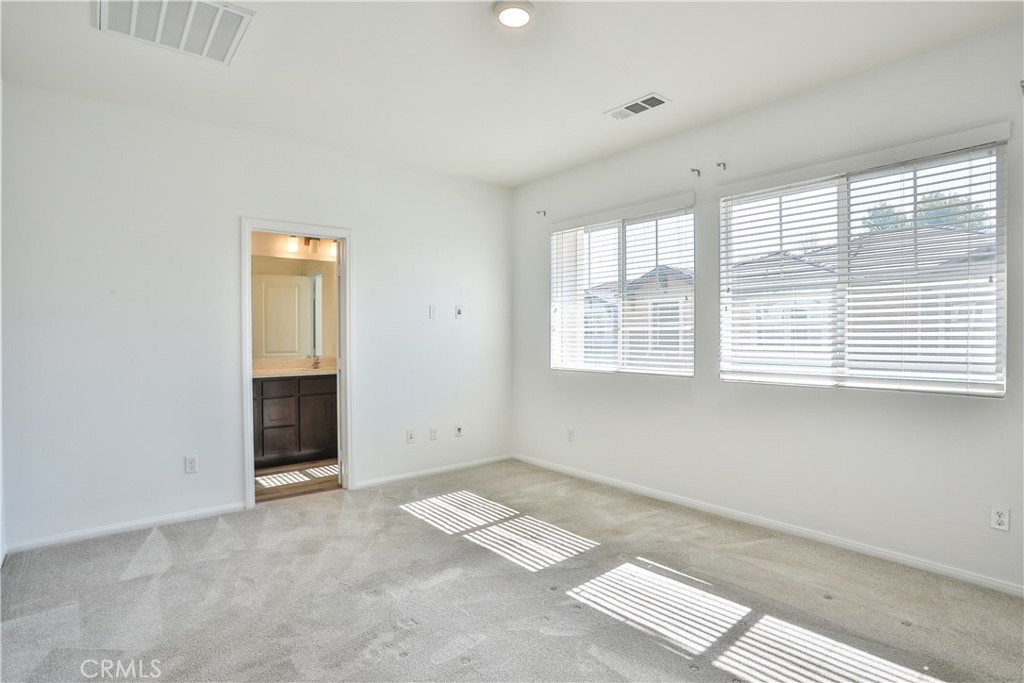 7863 Marbil Lane Riverside, CA 92504 - Photo 14 of 30 a view of an empty room with a window