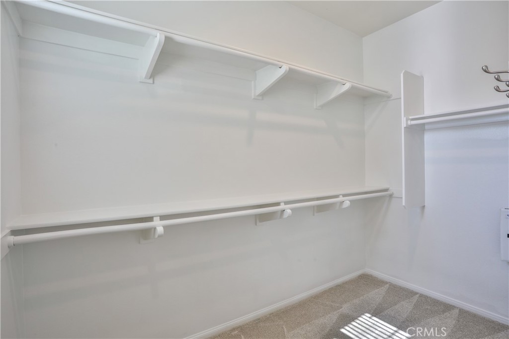 7863 Marbil Lane Riverside, CA 92504 - Photo 18 of 30 a view of an empty walk in closet