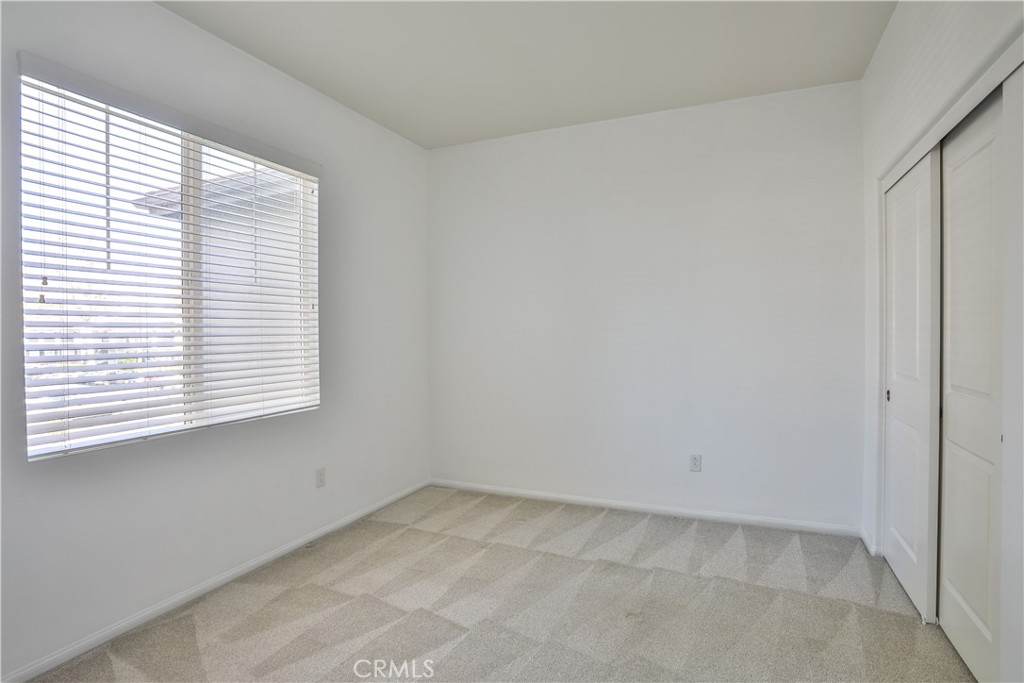 7863 Marbil Lane Riverside, CA 92504 - Photo 20 of 30 an empty room with a window
