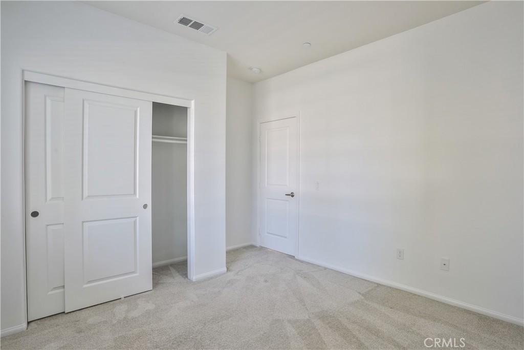 7863 Marbil Lane Riverside, CA 92504 - Photo 21 of 30 a view of an empty room