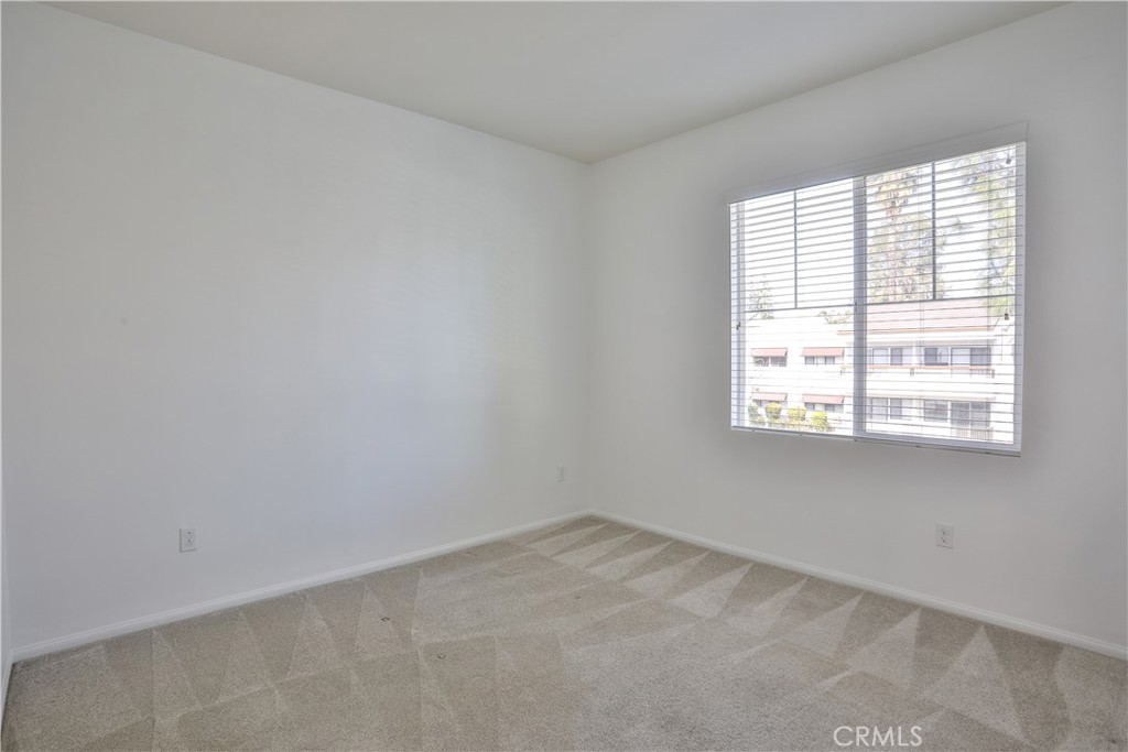 7863 Marbil Lane Riverside, CA 92504 - Photo 22 of 30 an empty room with a window