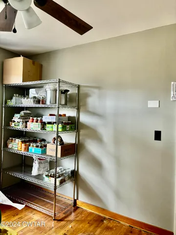 a kitchen with stainless steel appliances granite countertop a refrigerator a stove and a sink