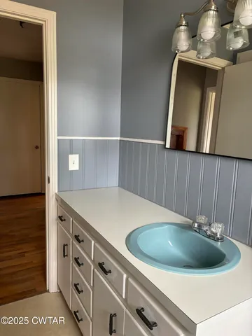 a kitchen with a stove and a sink