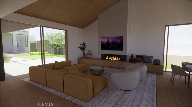 a living room with furniture a large window and a flat screen tv