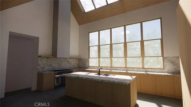 a room with a sink and a washer dryer