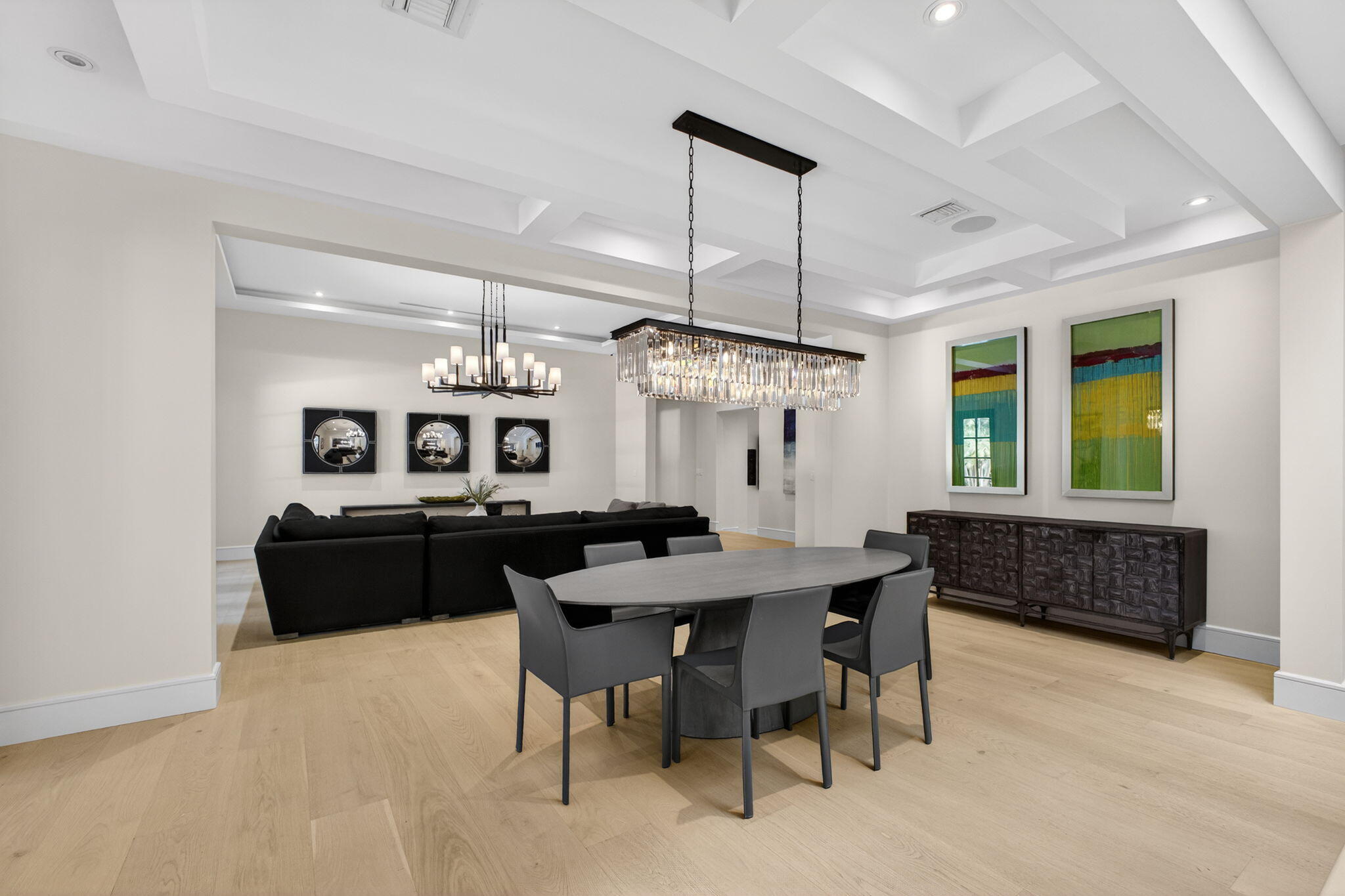 17 Carrick Road Palm Beach Gardens, FL 33418 - Photo 13 of 54 a kitchen that has a table chairs in it and wooden floor
