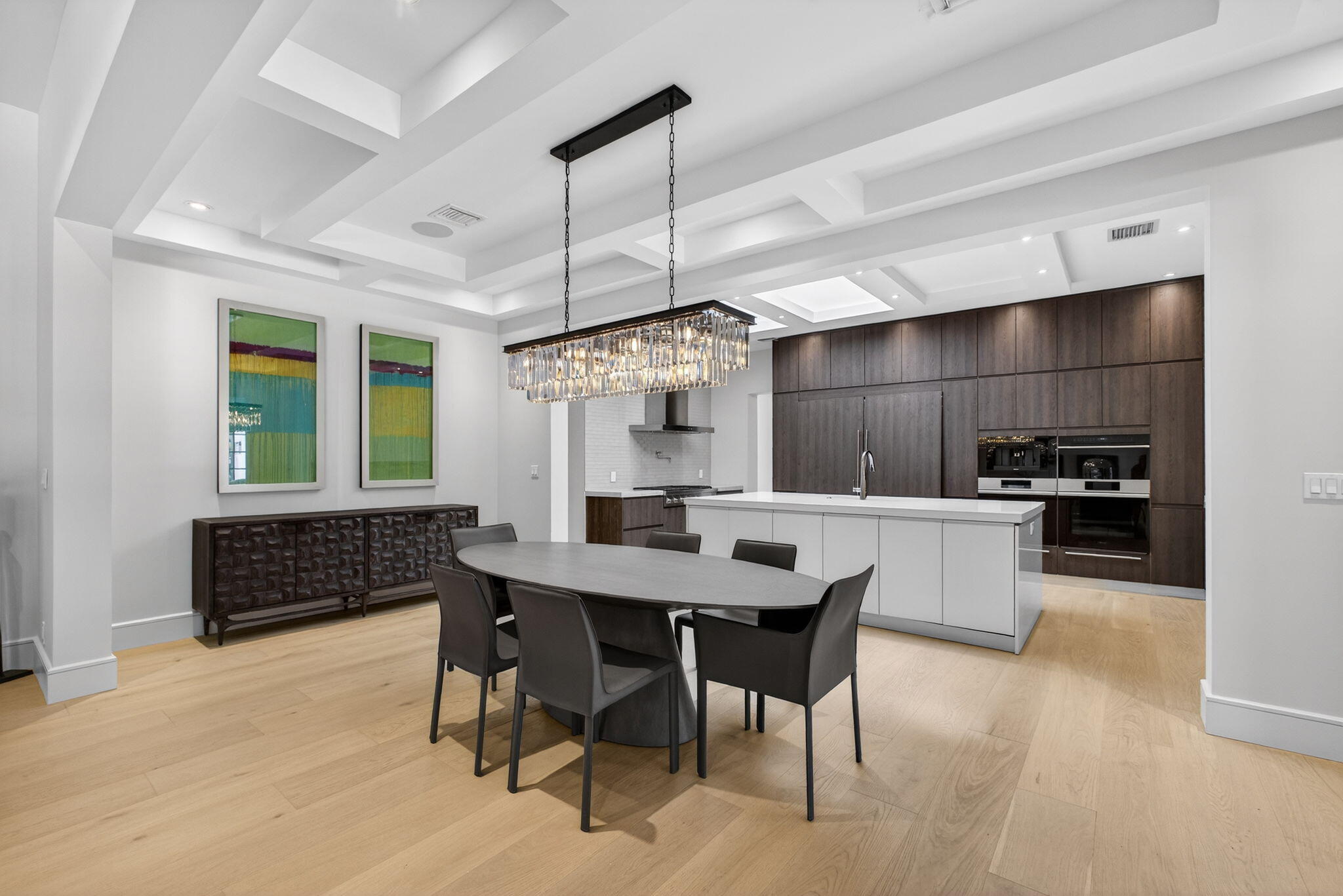 17 Carrick Road Palm Beach Gardens, FL 33418 - Photo 14 of 54 a kitchen with a table and chairs in it