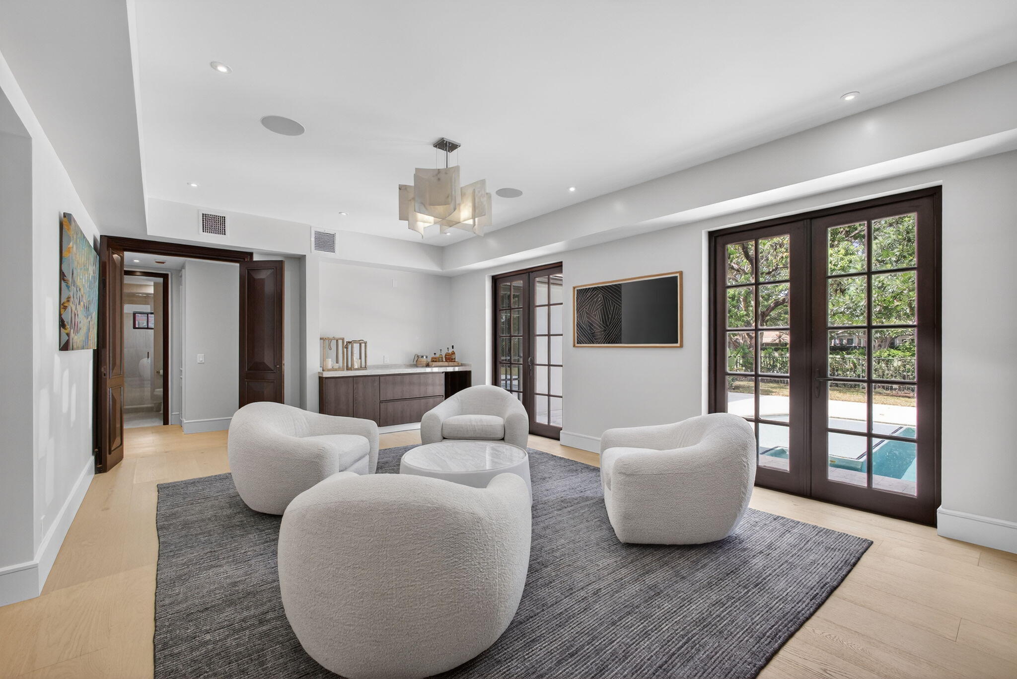 17 Carrick Road Palm Beach Gardens, FL 33418 - Photo 18 of 54 a living room with furniture and a window