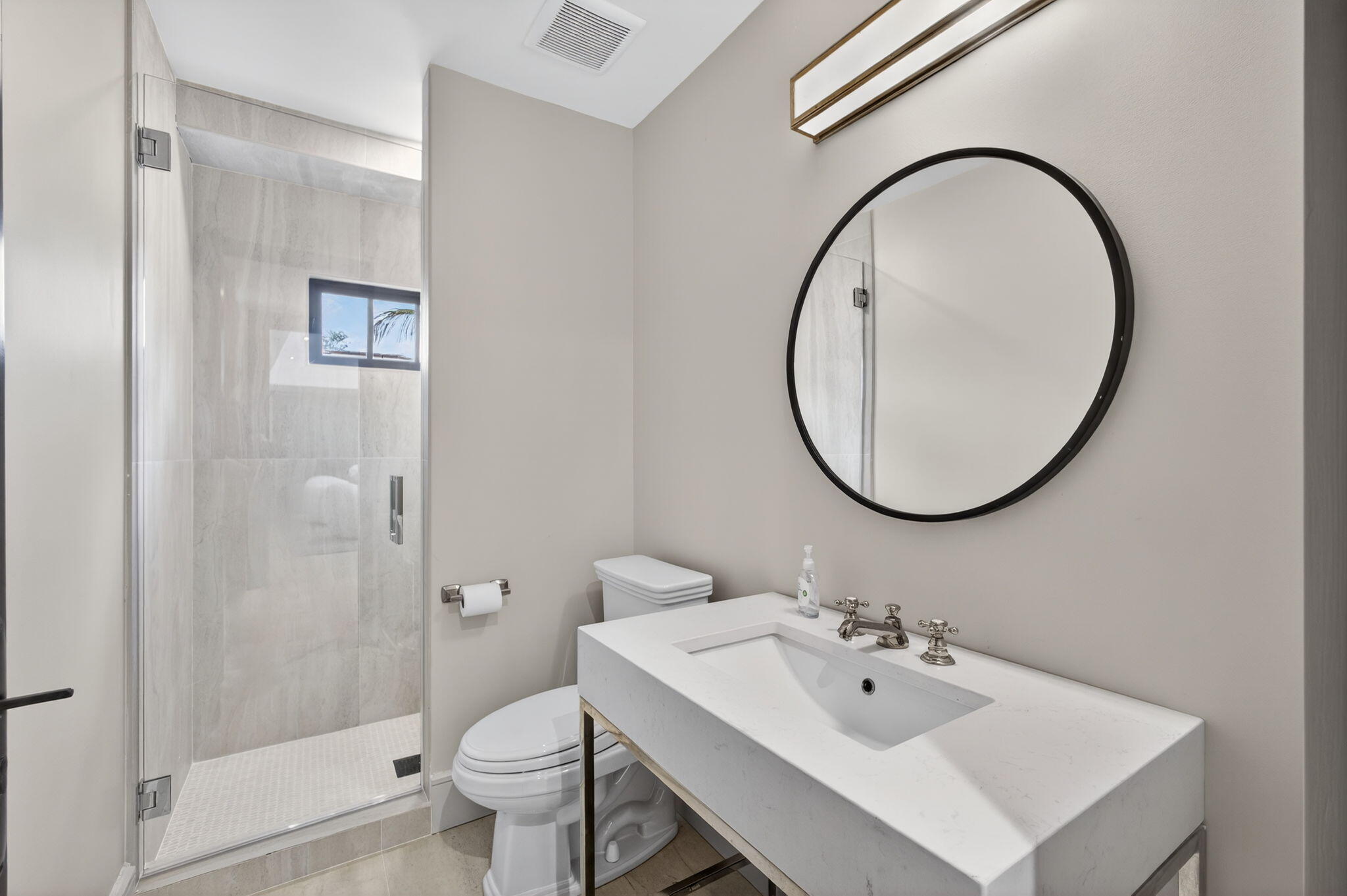 17 Carrick Road Palm Beach Gardens, FL 33418 - Photo 34 of 54 a bathroom with a sink and a mirror