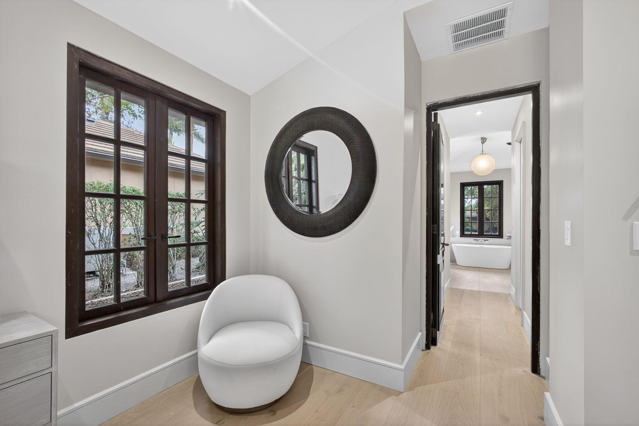 17 Carrick Road Palm Beach Gardens, FL 33418 - Photo 38 of 54 a bathroom with a toilet and a mirror
