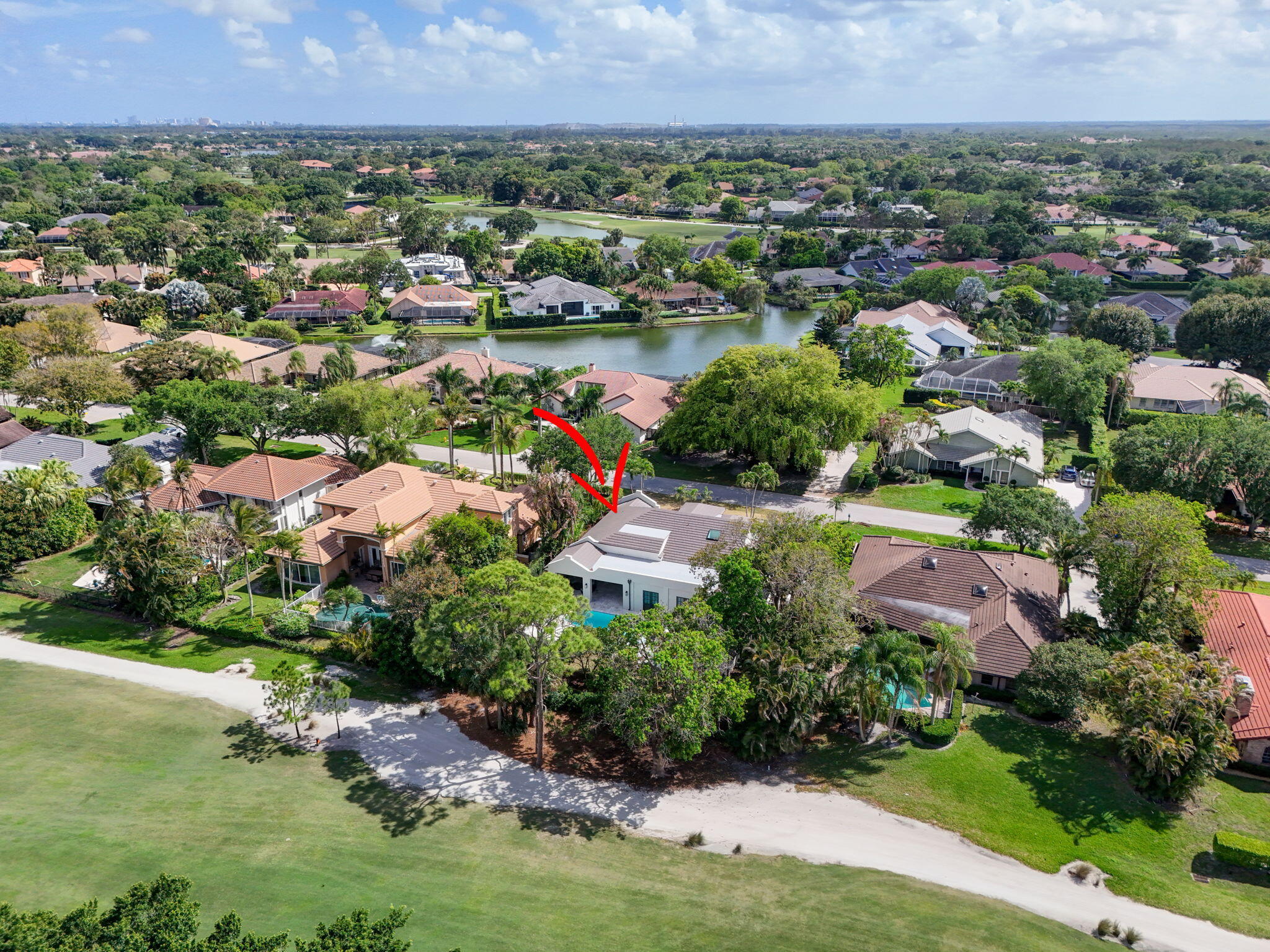 17 Carrick Road Palm Beach Gardens, FL 33418 - Photo 40 of 54 an aerial view of multiple house