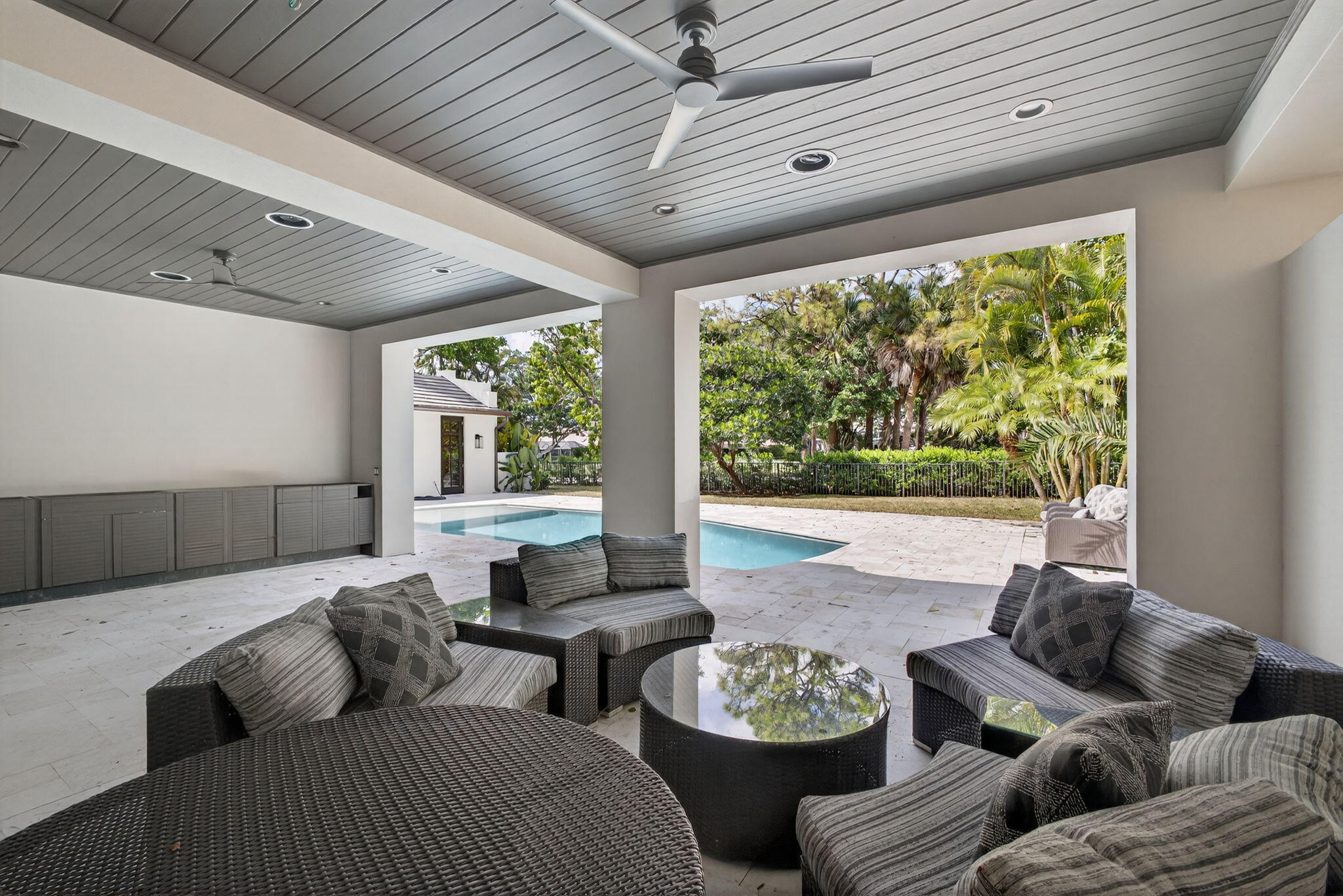 17 Carrick Road Palm Beach Gardens, FL 33418 - Photo 51 of 54 a living room with furniture and a large window