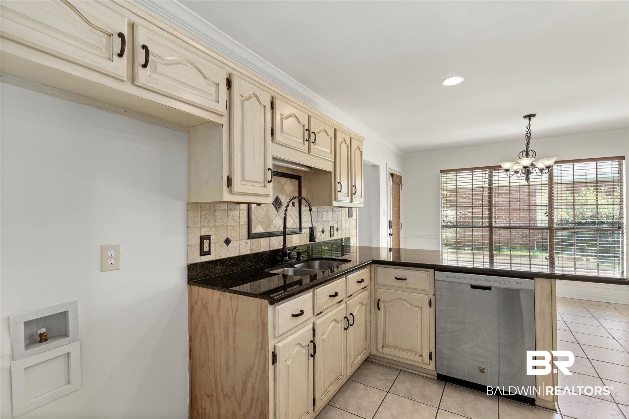 3032 Autumn Ridge Drive West Mobile, AL 36695 - Photo 7 of 20 Kitchen featuring dishwasher, a peninsula, a chandelier, light tile patterned floors, and recessed lighting