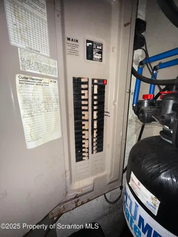 wooden floor fireplace and windows in a room