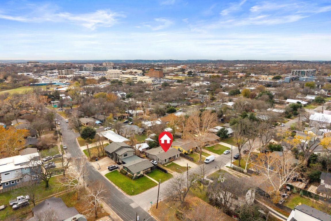 303 Irma Drive, Unit A Austin, TX 78752 - Photo 31 of 35 Aerial view of property's location with nearby urban area and nearby suburban area