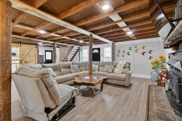 a view of a room with wooden walls