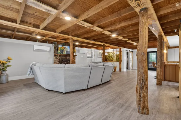 a view of a room with wooden walls