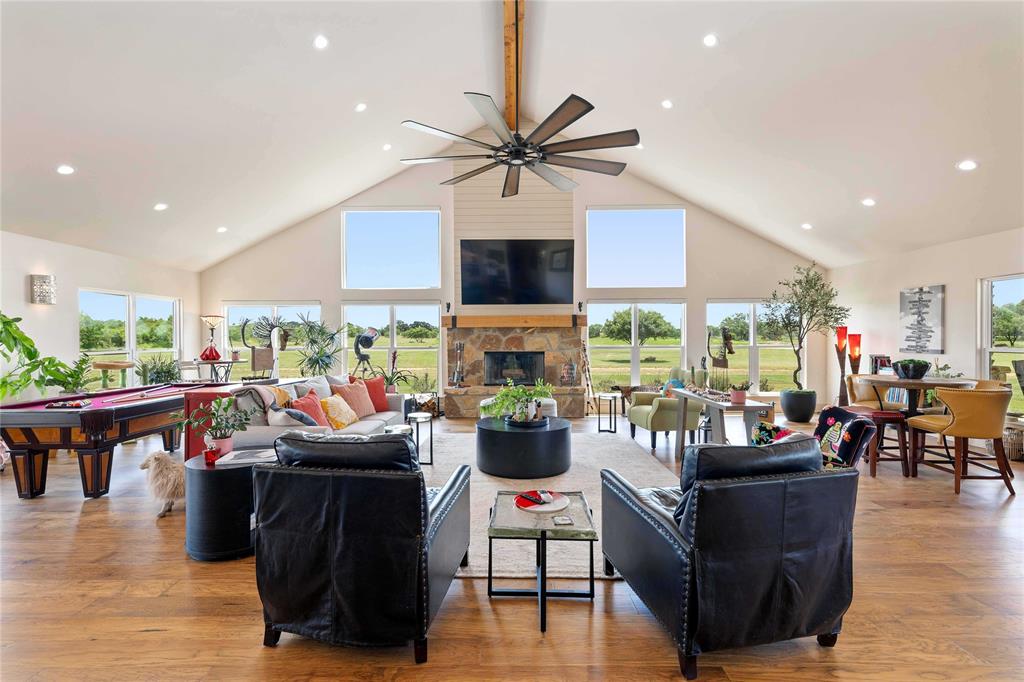 1010 Fm 583 Street West Rising Star, TX 76471 - Photo 16 of 40 a living room with fireplace furniture and a wooden floor