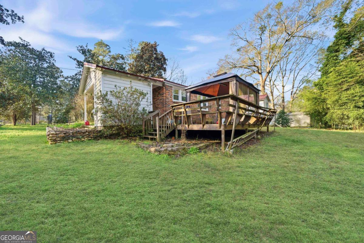 296 Kings Road Milledgeville, GA 31061 - Photo 33 of 36 a view of a house with a yard