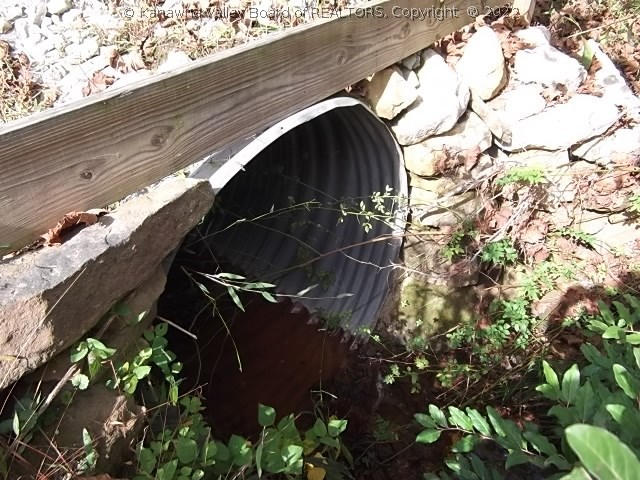 0 Big Pigeon Road Amma, WV 25005 - Photo 7 of 28 Culvert installed. Is not complete. Needs dirt and gravel on mobile home side of creek before use.