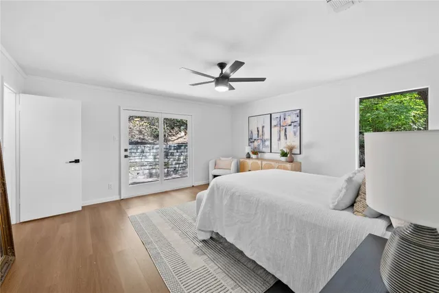 a bed room with a bed and a window