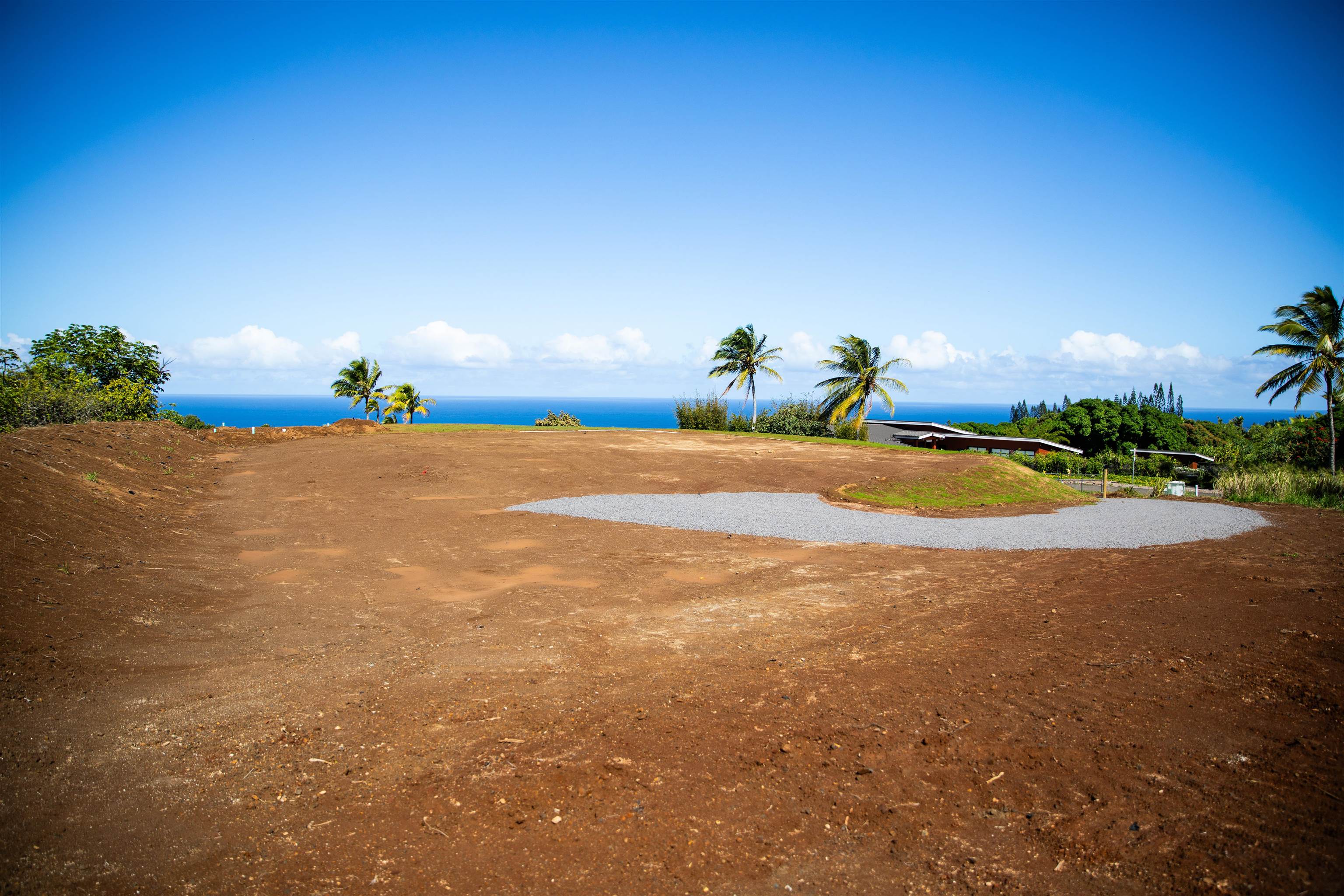 17 Kai Huki Street Haiku, HI 96708 - Photo 11 of 17 a view of a fire pit with an trees in the background