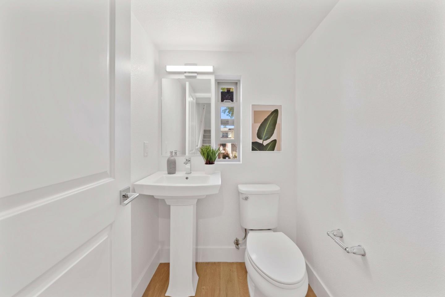 307 Marquetta Circle Mountain View, CA 94043 - Photo 17 of 38 a white toilet sitting next to a bathroom sink